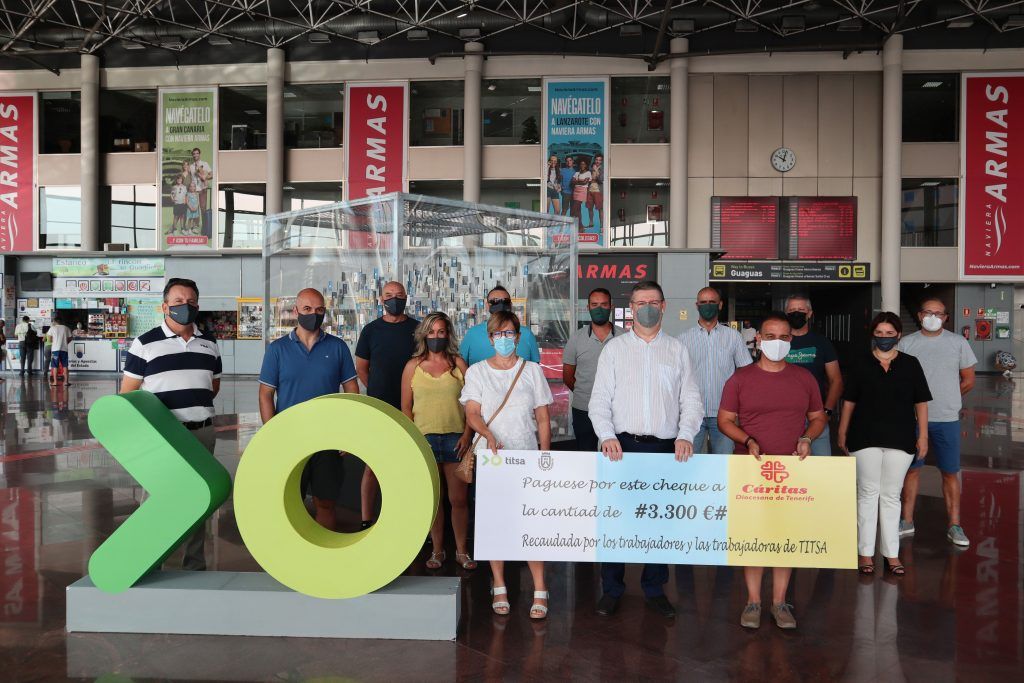 Los empleados de Titsa recaudan 3.300 euros para el Banco de Alimentos de  Cáritas